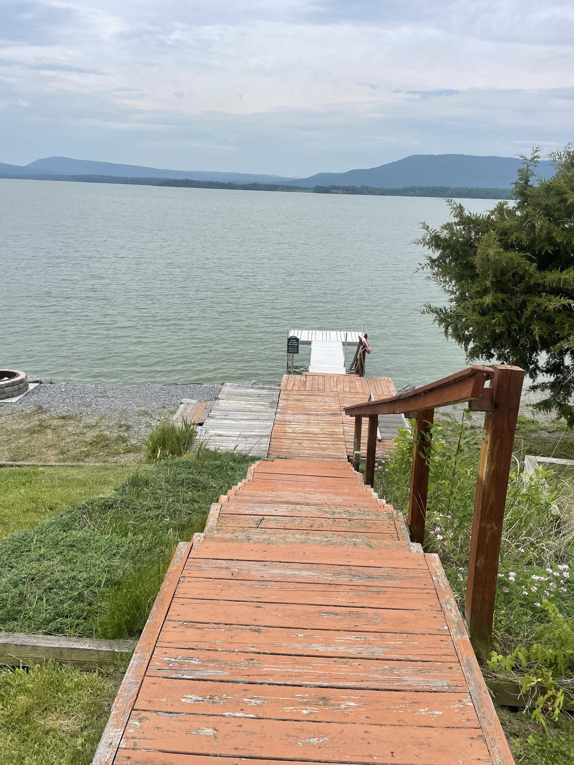Looking down the staircase toward the dock and open lake water